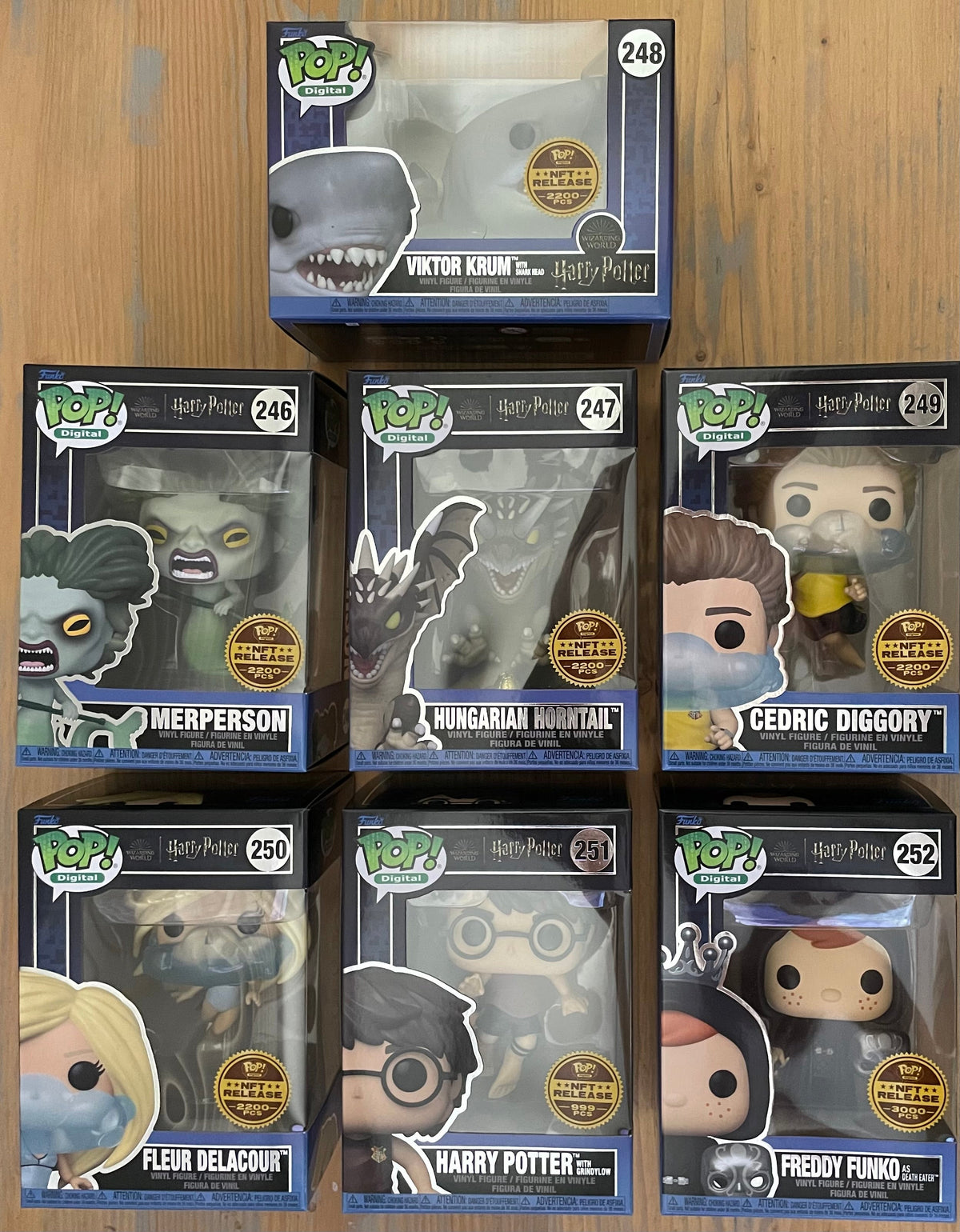 Funko Pop! Digital: Harry Potter - Harry, Cedric, Fleur, Krum, Horntail, Merperson & Freddy as Death Eater (Set of 7)